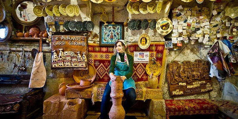 Visitors trying pottery wheel in Avanos workshop Cappadocia
