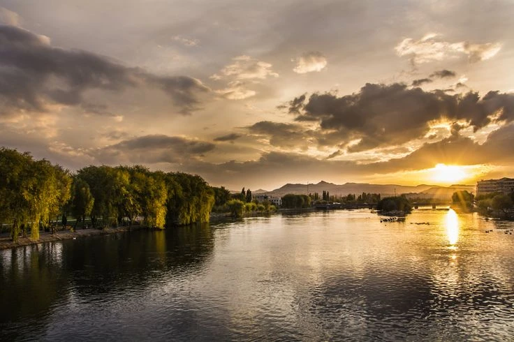 Sunset over the historical stone houses in Avanos