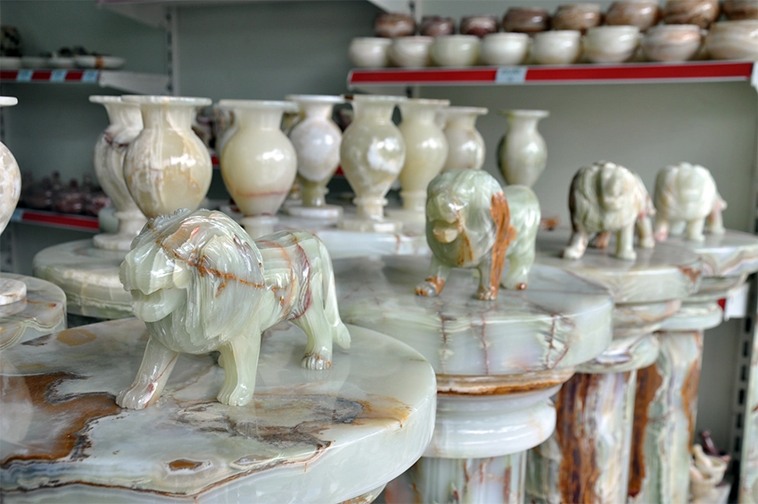 Local artisan carving and polishing onyx stone in Cappadocia