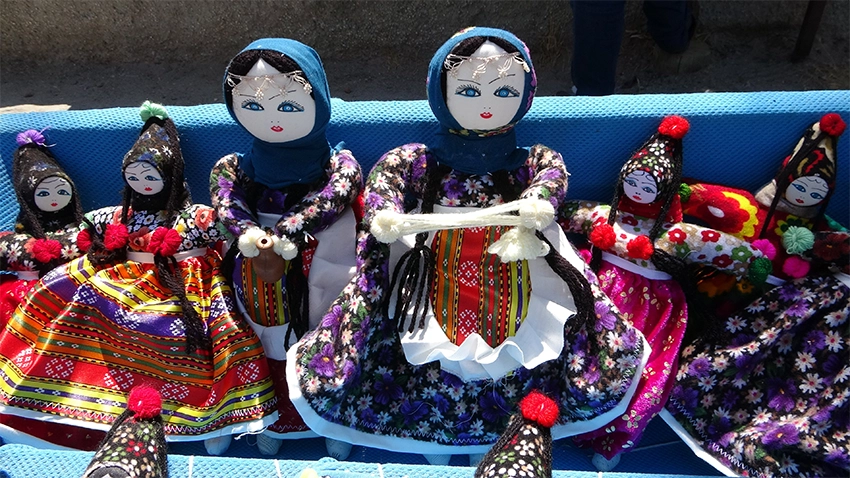 Colorful Soğanlı dolls on display in Cappadocia souvenir shop