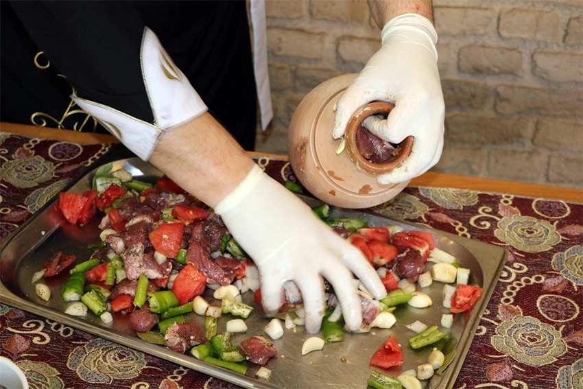 Preparation of Testi Kebab in clay pot, Cappadocia