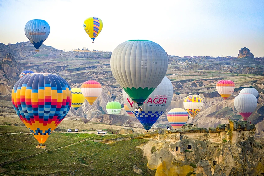 Cappadocia panoramic sunrise landscape with balloons